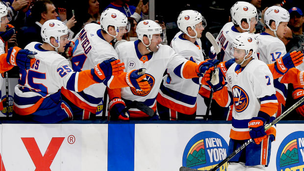 New York Islanders right wing Jordan Eberle (7) is congratulated after scoring a goal against the Detroit Red Wings during a February 2020 game at Nassau Veterans Memorial Coliseum.